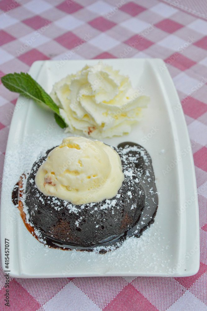 Mohr im Hemd - Austrian dessert, kind of brownies, but more tasty, with ice cream and cool whip Mohr im Hemd - Austrian dessert, kind of brownies, but more tasty, with ice cream and cool whip
