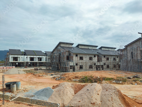 SEREMBAN, MALAYSIA -APRIL 15, 2020: New double story luxury terrace house under construction in Malaysia. Designed by an architect with a modern and contemporary style.