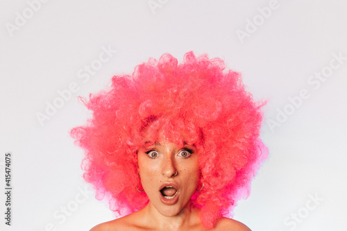 Woman having shock facial emotion and open mouth