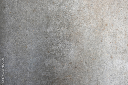 old light gray concrete wall with granular structure. rough surface texture