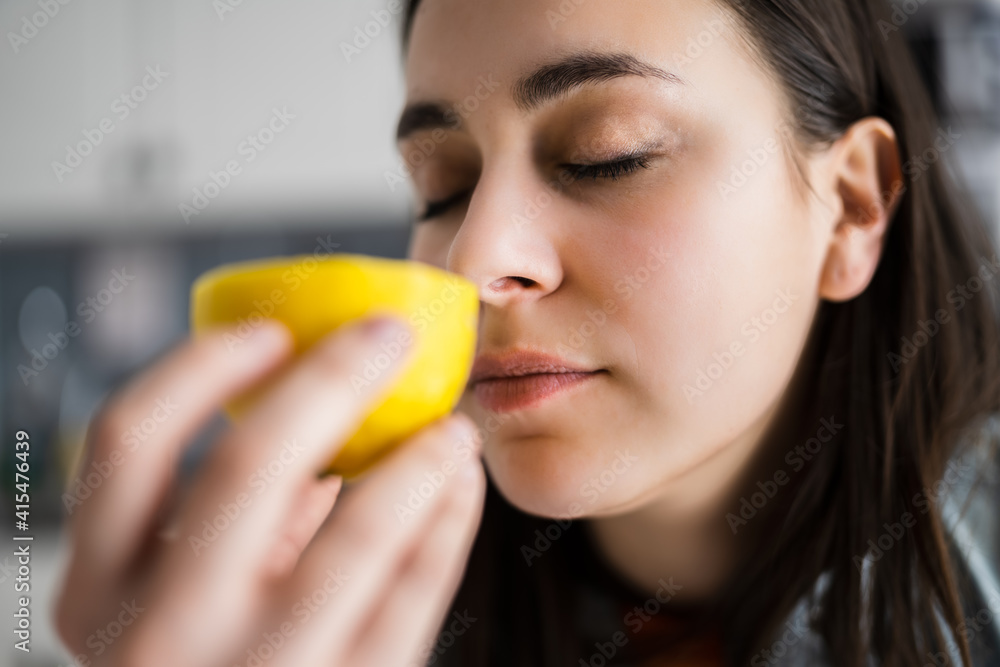 Woman Nose Sniffing Lemon Smell
