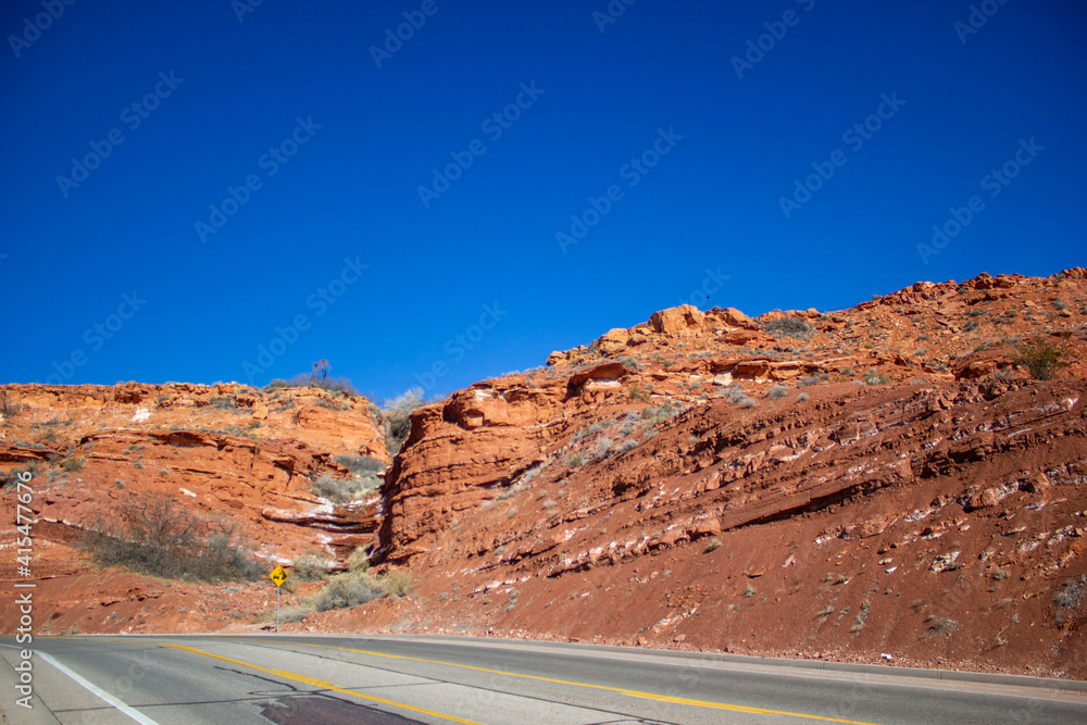 Red rocks against a blue sky