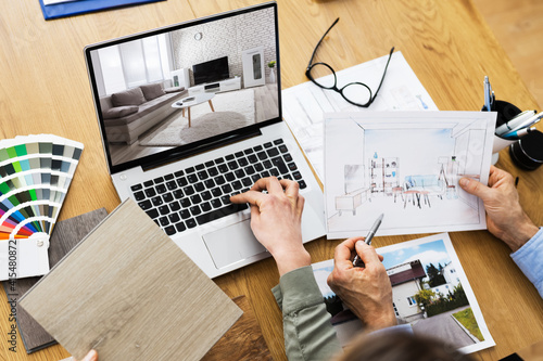 House Designer And Decorators Using Computer