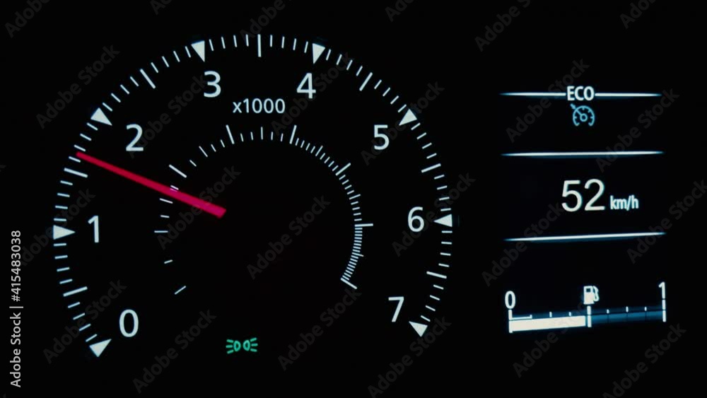Close up shot of a speedometer in a car in motion.
Speed in Km/h is shown on the display. Close up shot of a speedometer in a car in motion.
Speed in Km/h is shown on the display.