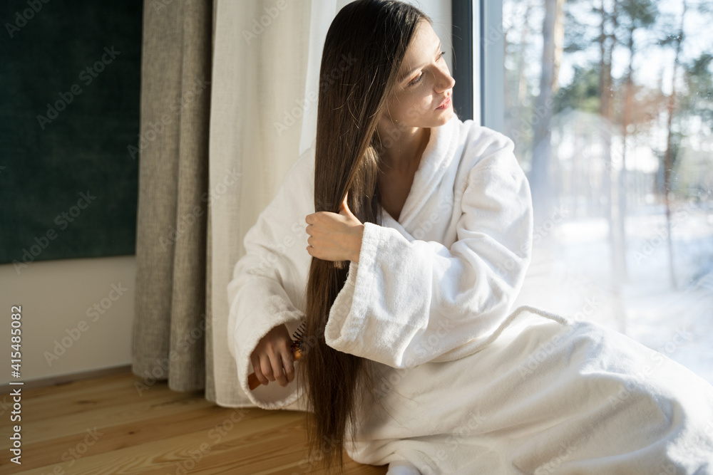 Woman brush long healthy brunette hair Woman brush long healthy brunette hair