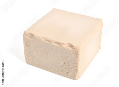 Fresh Pressed (Compressed) Bakers Yeast Cube. Isolated on White.