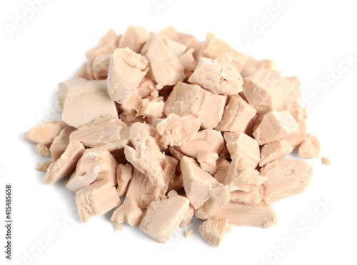 Fresh Pressed (Compressed) Bakers Yeast Crumbled Pile. Isolated on White.