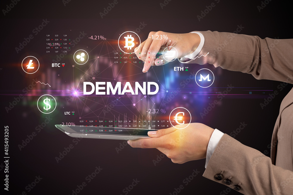 Close-up of a touchscreen with DEMAND inscription, business opportunity concept Close-up of a touchscreen with DEMAND inscription, business opportunity concept