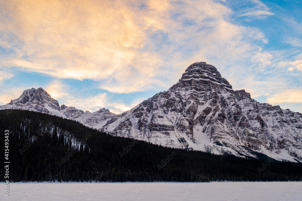Beautiful view of Bow Lake and Bow Peak with colorful clouds, in Banff national park, Canada Beautiful view of Bow Lake and Bow Peak with colorful clouds, in Banff national park, Canada
