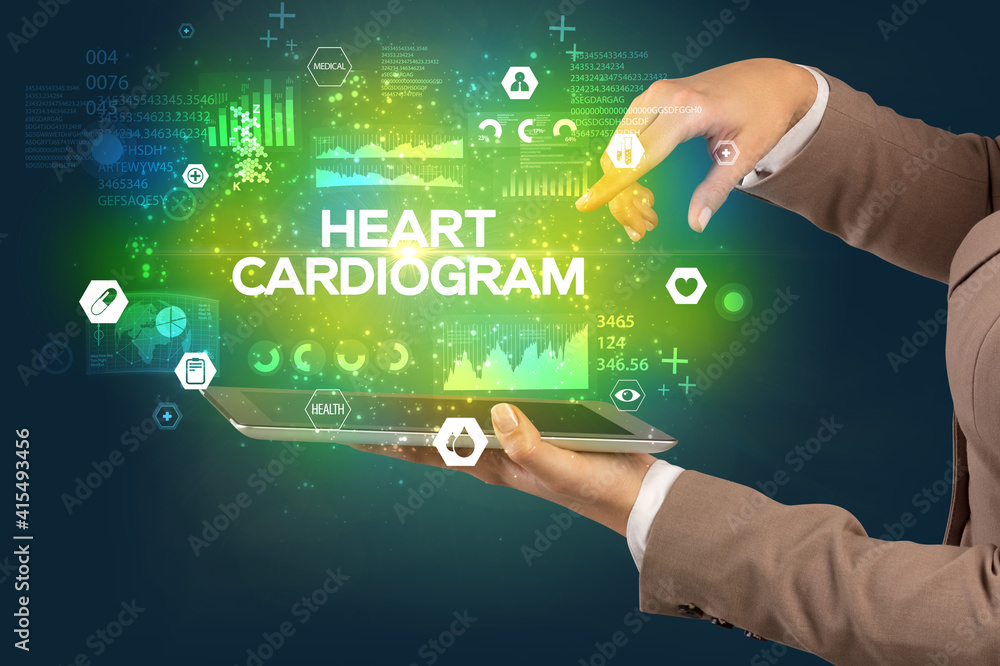 Close-up of a touchscreen with HEART CARDIOGRAM inscription, medical concept Close-up of a touchscreen with HEART CARDIOGRAM inscription, medical concept