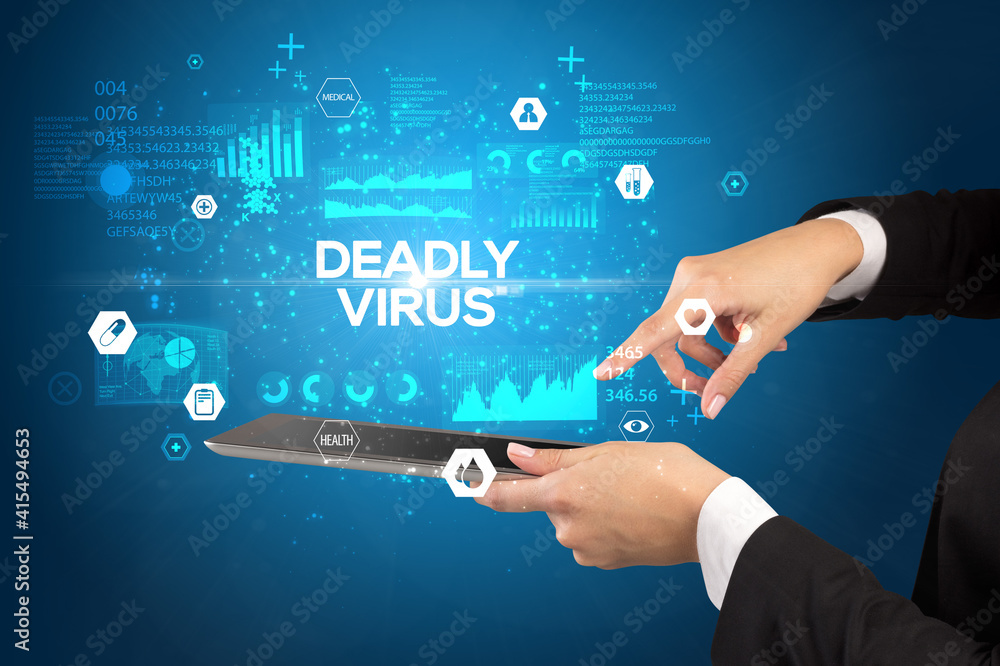 Close-up of a touchscreen with DEADLY VIRUS inscription, medical concept