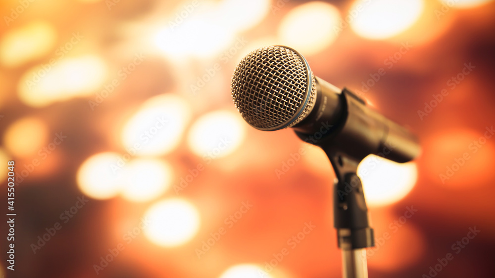 Public speaking backgrounds, Close-up the microphone on stand for speaker  speech presentation stage performance with blur and bokeh light background.  Stock Photo | Adobe Stock
