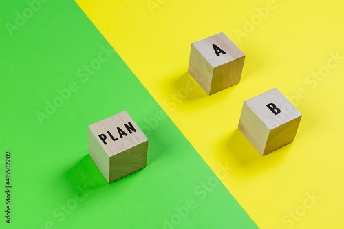 Wooden block with word PLAN A and PLAN B.