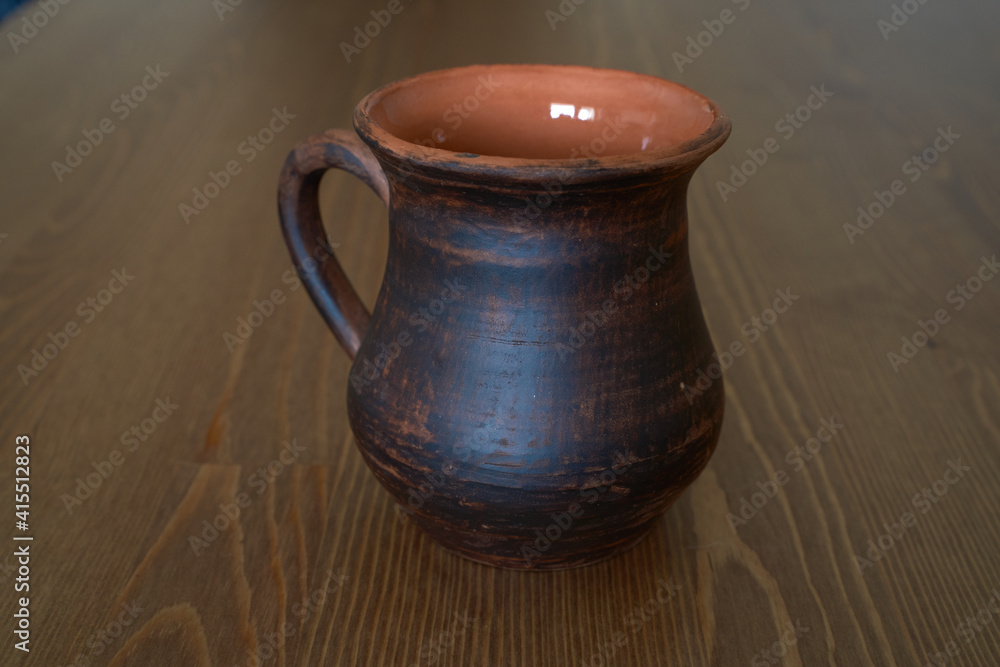 Ceramics, ceramic product mug with your own hands, made on a potter's wheel Ceramics, ceramic product mug with your own hands, made on a potter's wheel