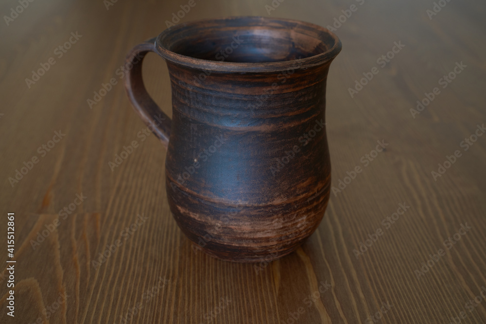 Ceramics, ceramic product mug with your own hands, made on a potter's wheel Ceramics, ceramic product mug with your own hands, made on a potter's wheel