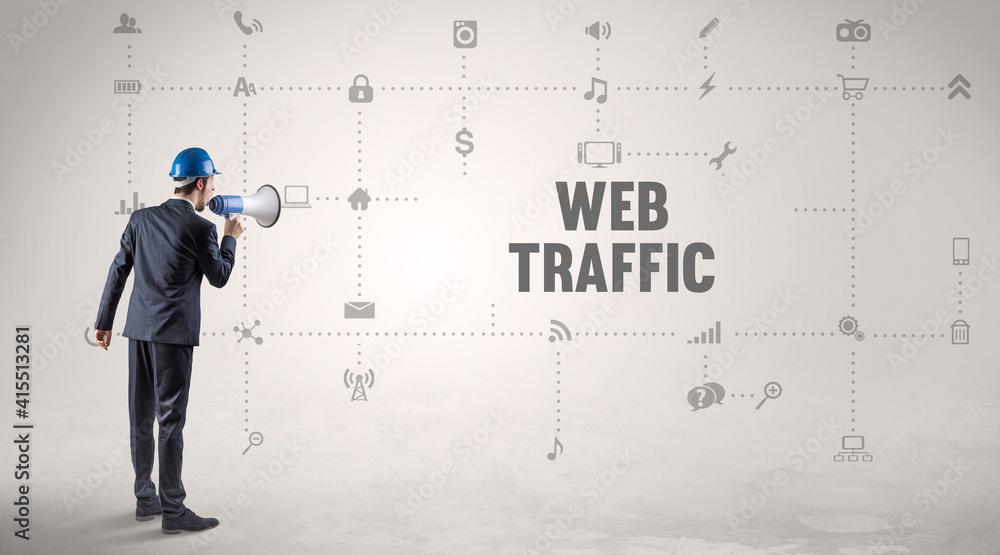 Engineer working on a new social media platform with WEB TRAFFIC inscription concept Engineer working on a new social media platform with WEB TRAFFIC inscription concept