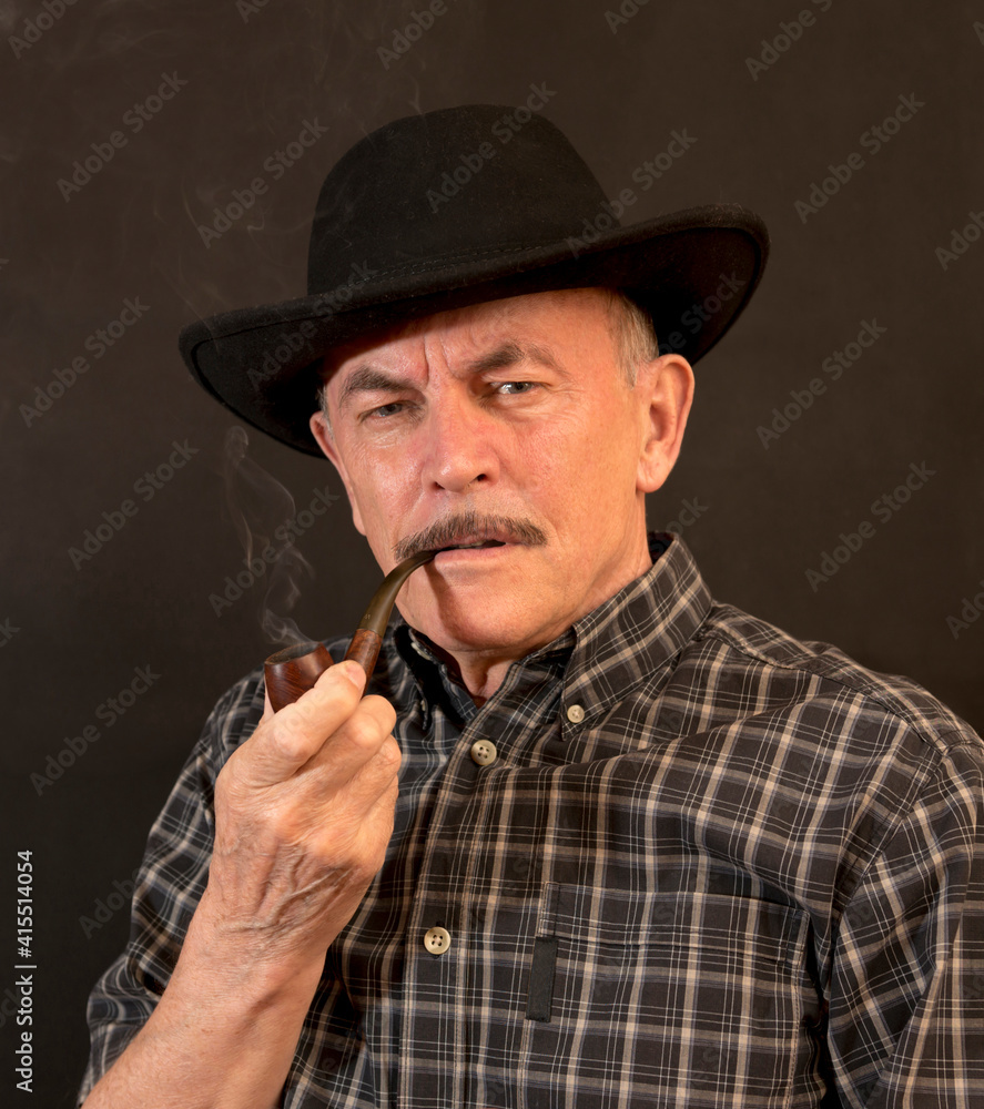 Cowboy in hat with Pipe Cowboy in hat with Pipe