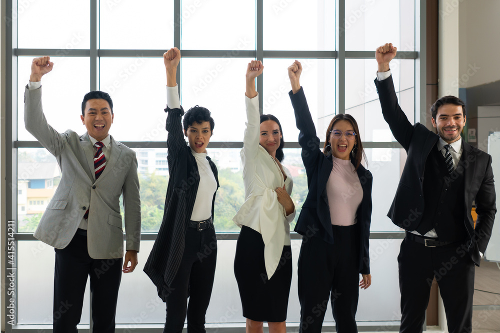 multicultural business team including asian and caucasian people celebrate success of project in office. diversity of business concept multicultural business team including asian and caucasian people celebrate success of project in office. diversity of business concept