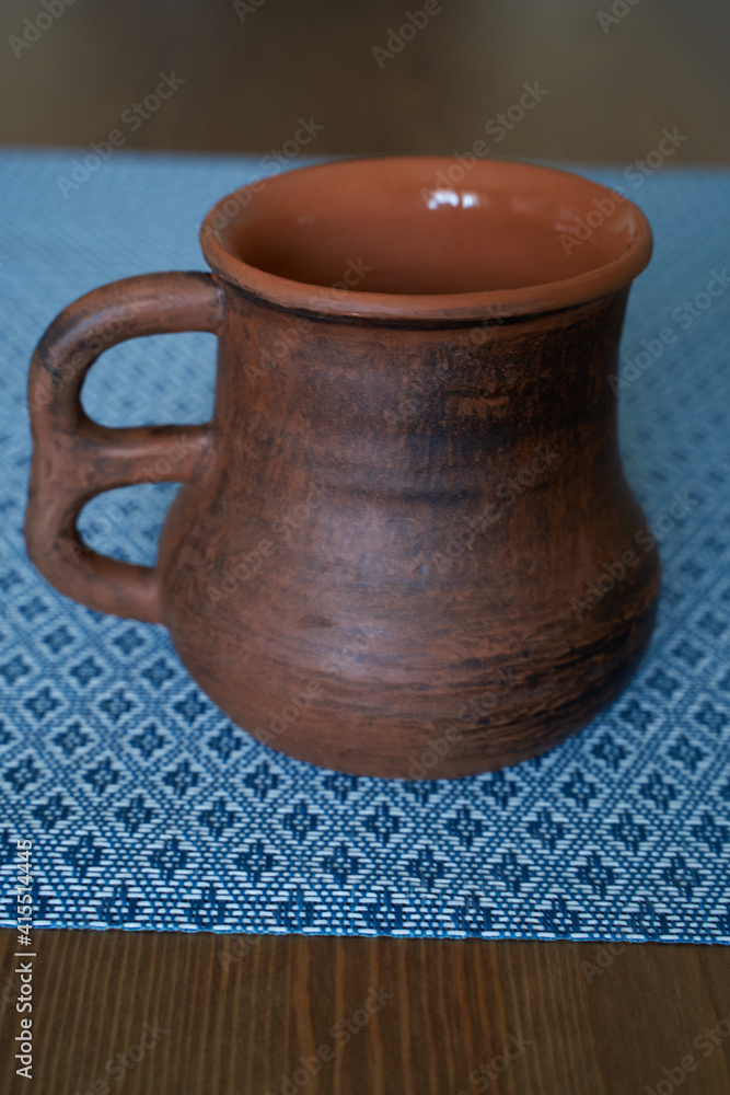 Ceramics, ceramic product mug with your own hands, made on a potter's wheel Ceramics, ceramic product mug with your own hands, made on a potter's wheel