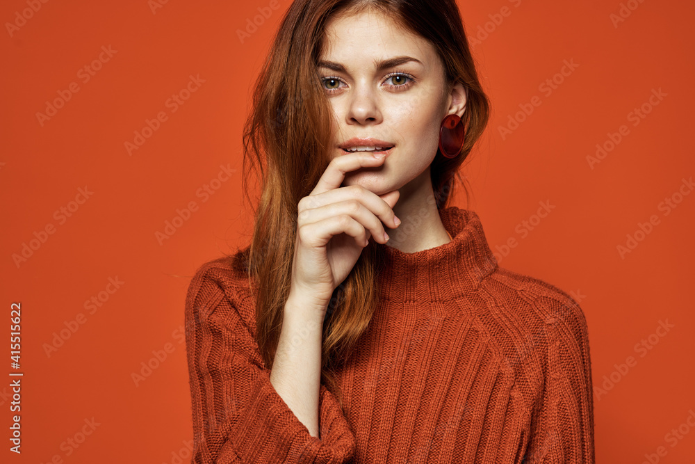attractive woman earrings jewelry red sweater fashion clothing studio attractive woman earrings jewelry red sweater fashion clothing studio