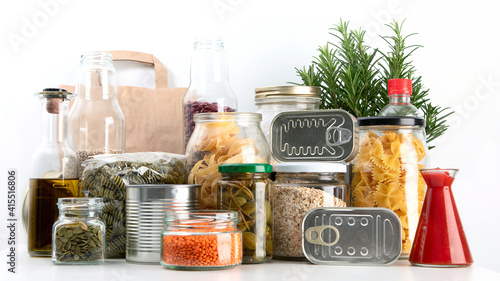 Food pantry for staying home. Grains and oats in jars photo