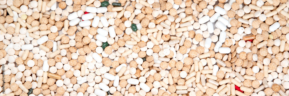 Background made of different pills. Concept of illness and treatment. Medicine and healthcare. Background made of different pills. Concept of illness and treatment. Medicine and healthcare.