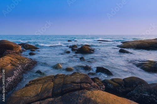 Rocks on the beach in the evening