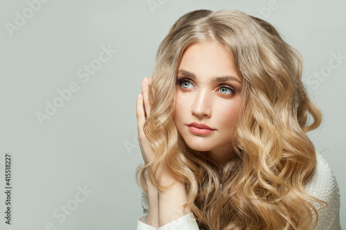 Cute blonde woman portrait on white background