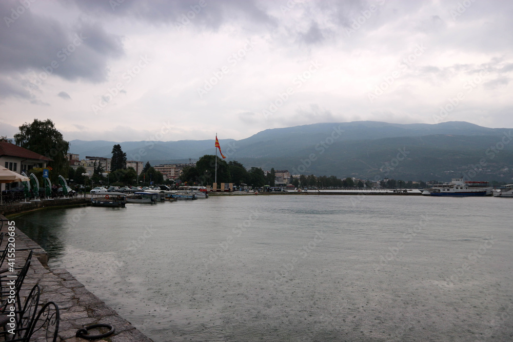 view of the city of Ohrid on the coast of the lake in North macedonia in rainy weather