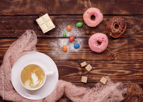cup of coffee,  cookies,  doughnut, sweets, chocolates on wooden background  