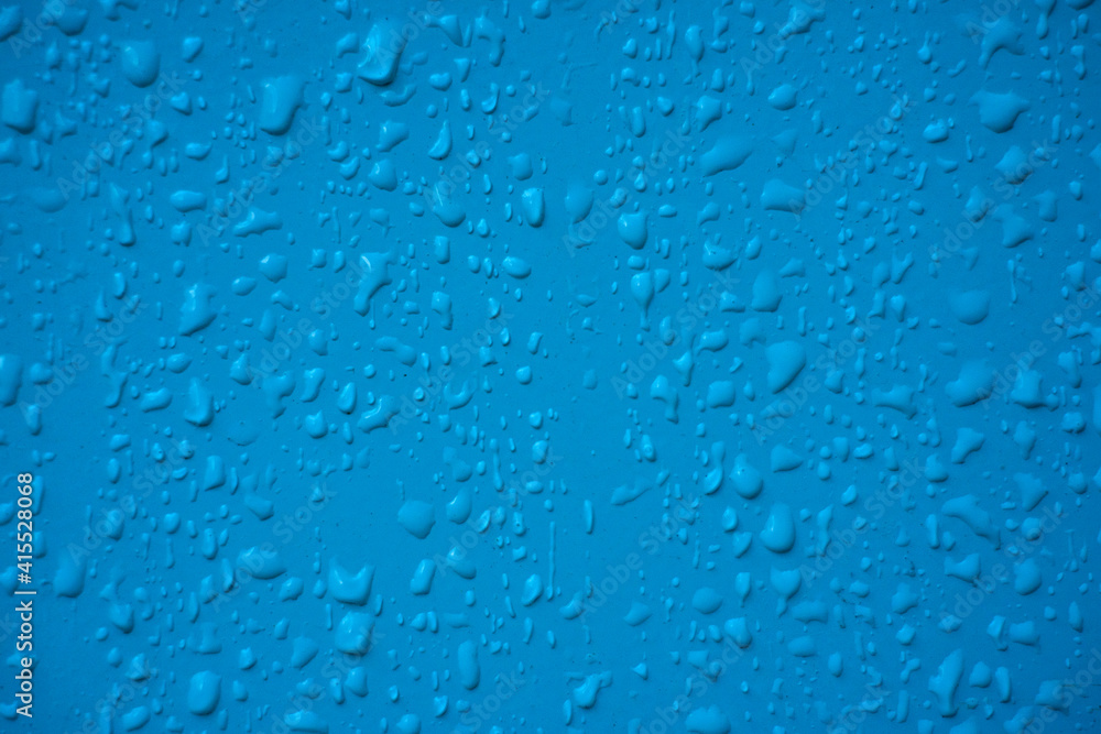 Raindrops on a blue background Raindrops on a blue background