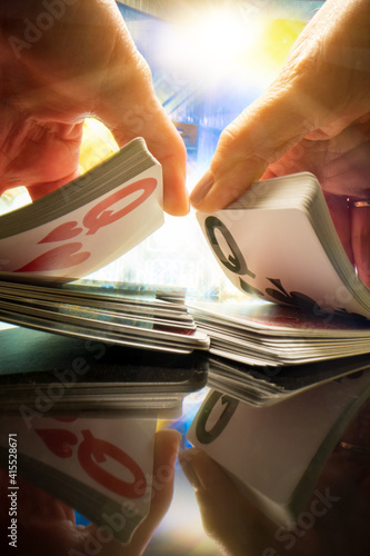 Woman shuffling cards at the casino t photo