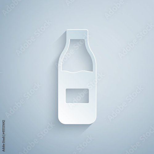 Paper cut Closed glass bottle with milk icon isolated on grey background. Paper art style. Vector.
