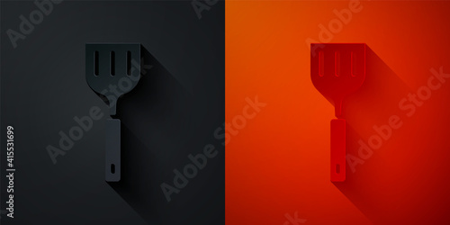 Paper cut Spatula icon isolated on black and red background. Kitchen spatula icon. BBQ spatula sign. Barbecue and grill tool. Paper art style. Vector.