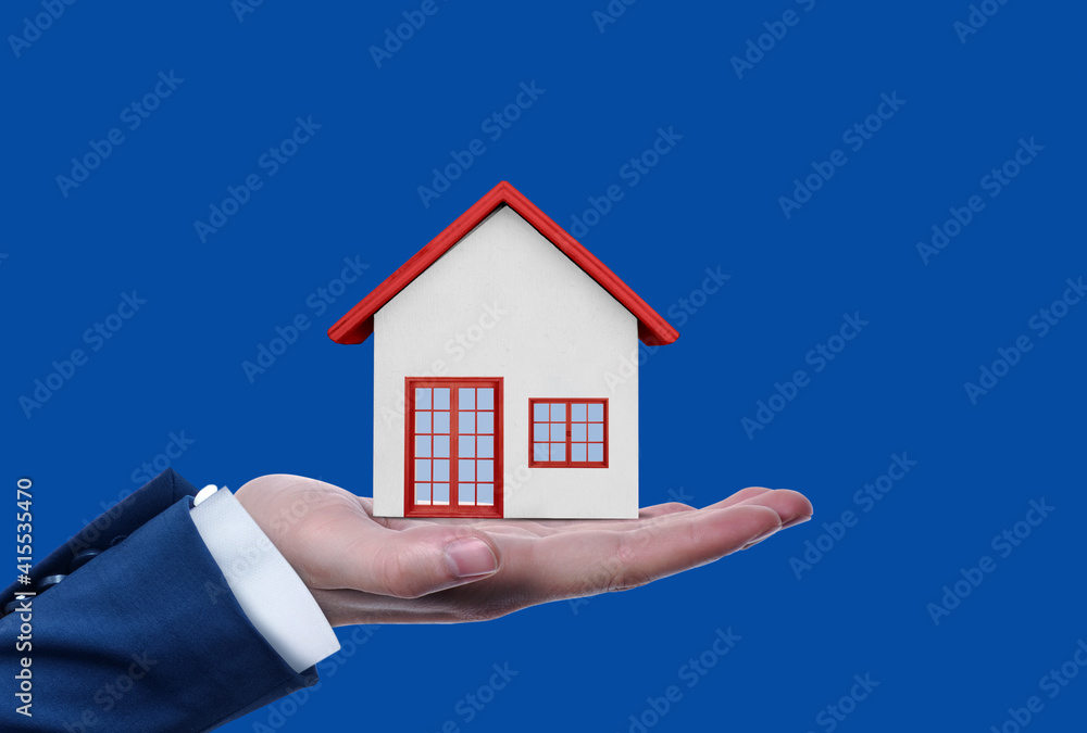 hand holding home, home loan concept hand holding home, home loan concept
