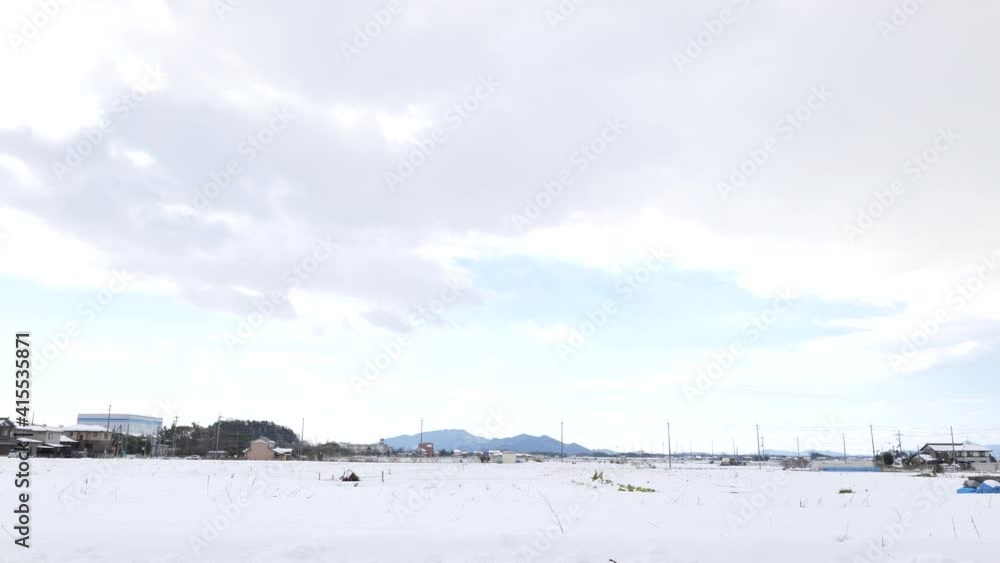 A snowy city scene in winter in Japan A snowy city scene in winter in Japan