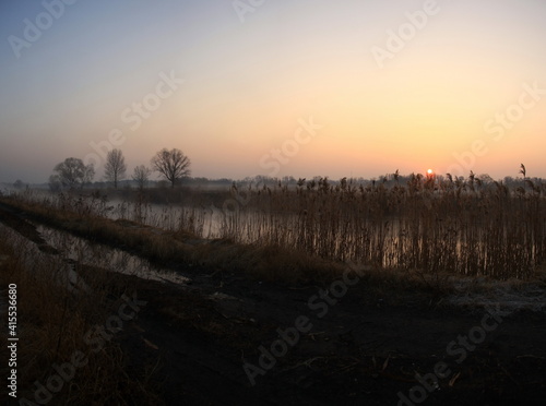 Spring landscape - dawn over the spring river