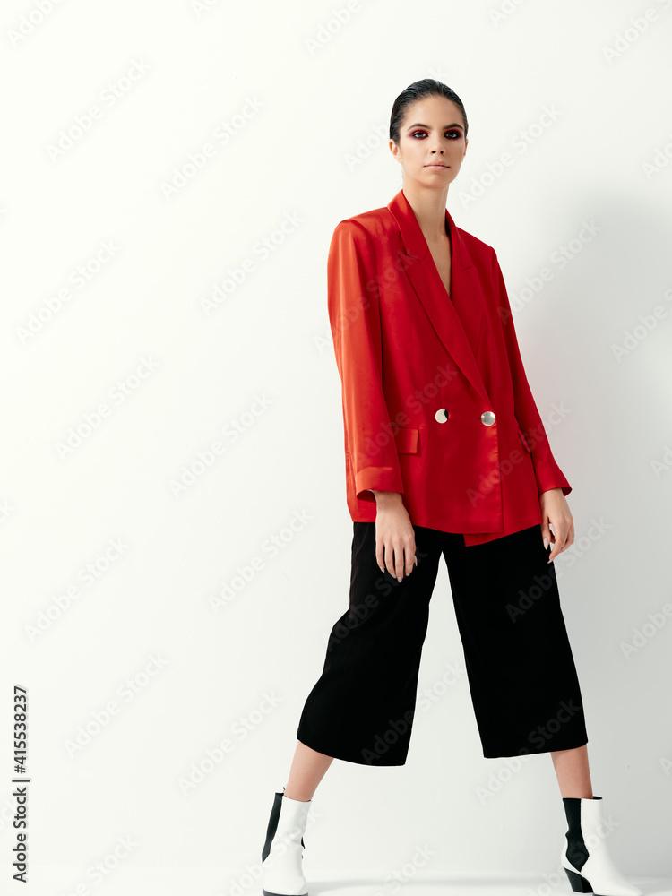 woman fashionable clothes red jacket light isolated background woman fashionable clothes red jacket light isolated background