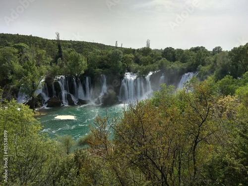 Deep forest in Europe with river and lake