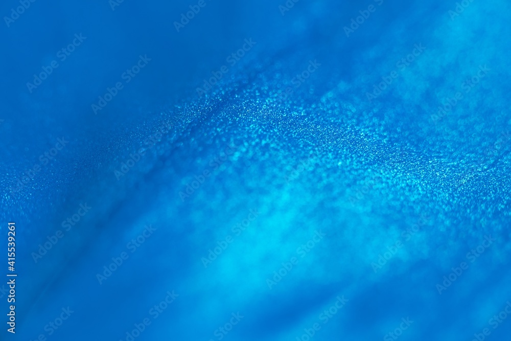 Smooth colorful liquid flowing as background texture Smooth colorful liquid flowing as background texture