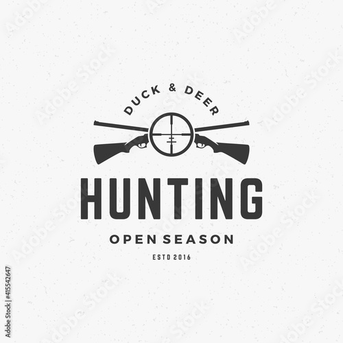 Hunting club vintage logo template emblem. Cross guns and target silhouette.