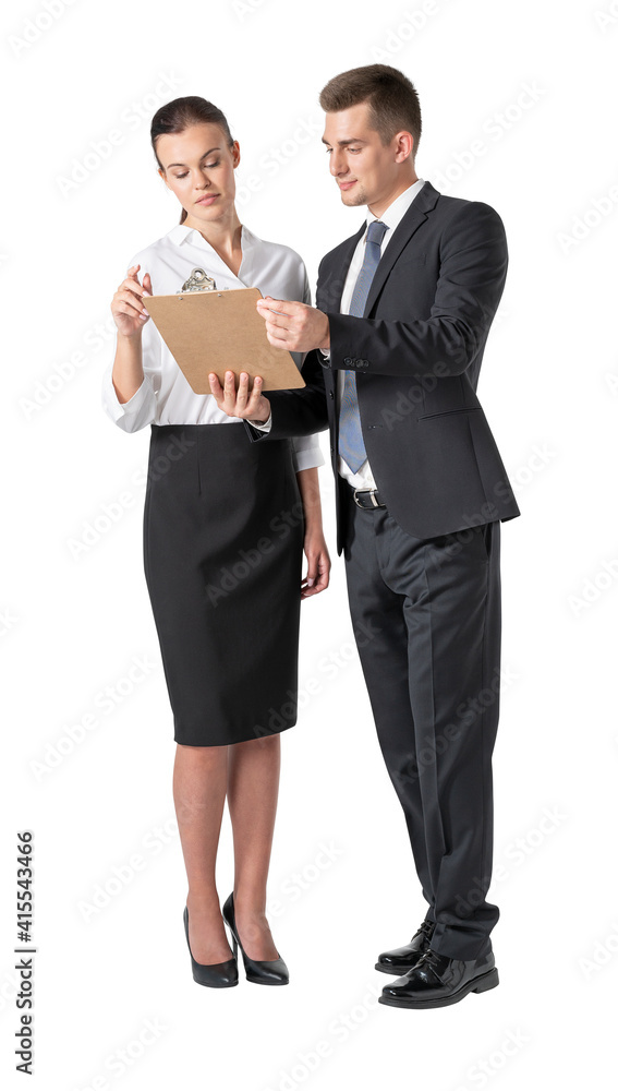 Serious young European businessman and businesswoman discussing work, isolated Serious young European businessman and businesswoman discussing work, isolated