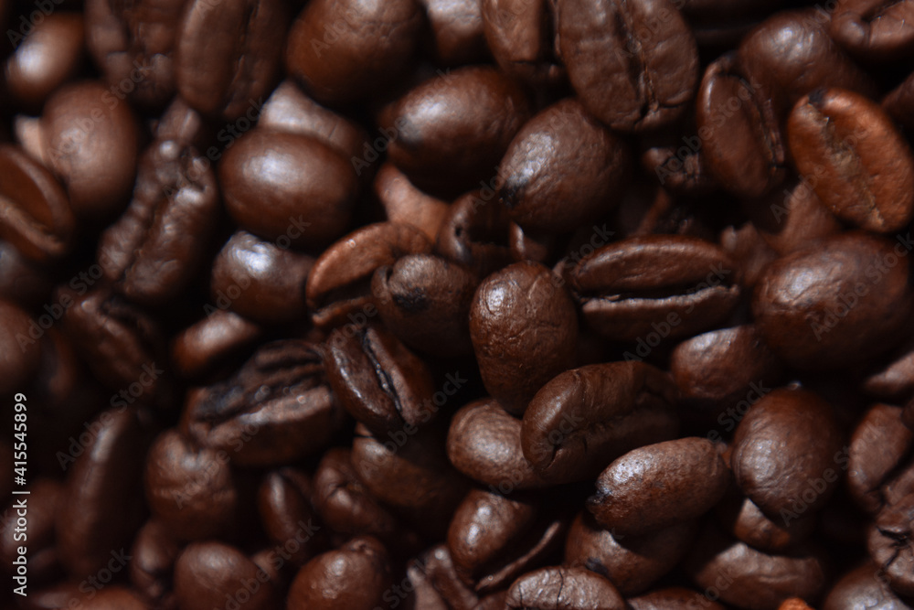 coffee beans lie on the background arabica coffee beans lie on the background arabica