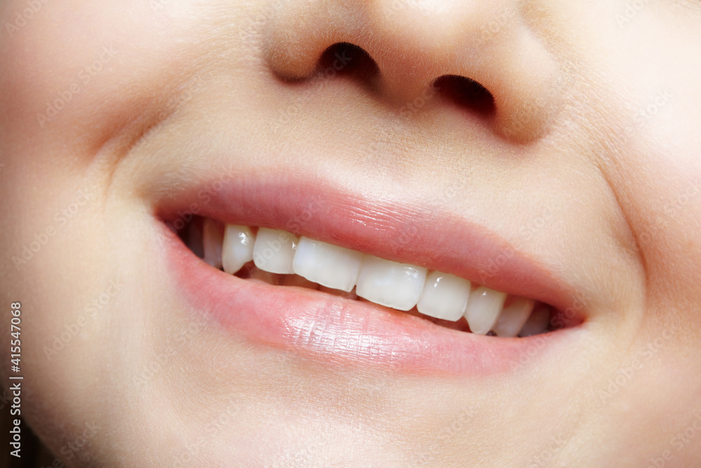 Obraz premium Human mouth and nose. Closeup macro portrait of young female teenager part of face