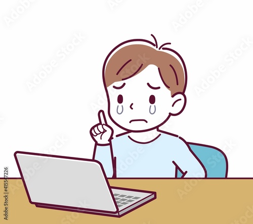 Cheerful boy in blue clothes