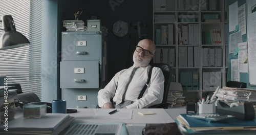 Lazy businessman wasting time at work