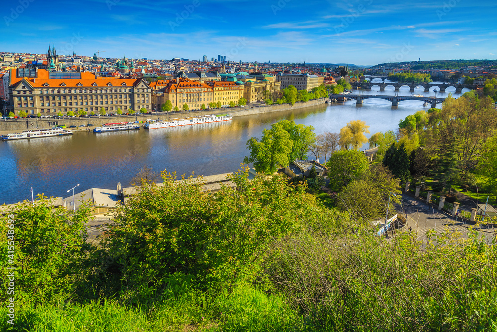 Fototapeta premium Prague cityscape with old buildings on the waterfront, Czech Republic