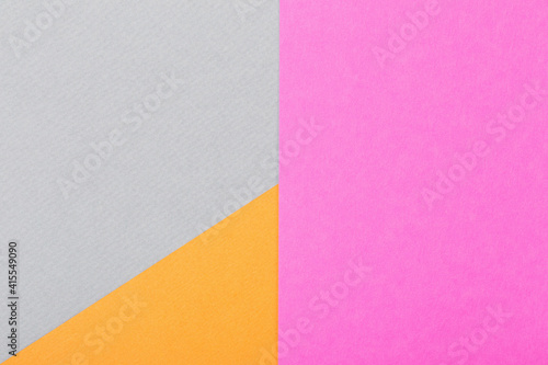 background from colored sheets of cardboard top view