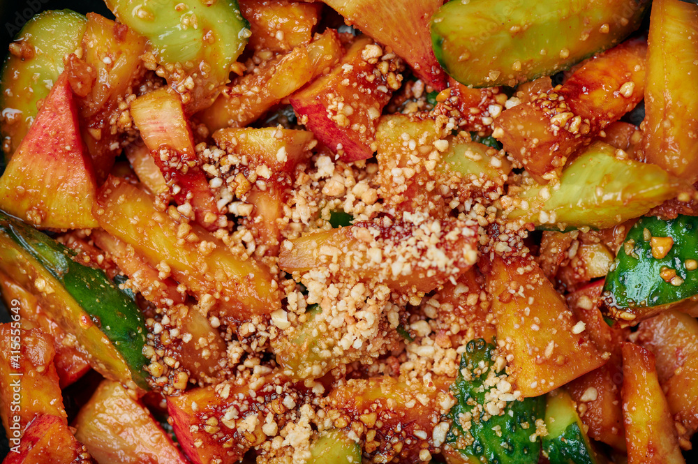 Penang Rojak close up. Malaysian or indonesian cuisine fruits and vegetables salad dish. Asian Food. Penang Rojak close up. Malaysian or indonesian cuisine fruits and vegetables salad dish. Asian Food.