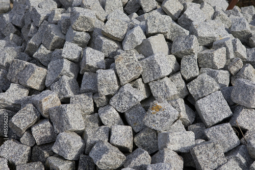 A pile of granite stones for construction.